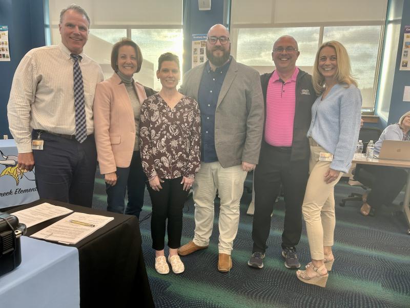 District and union leaders signed a five-year Cape Henlopen Education Association contract April 25 after only two days in negotiations through interest-based bargaining. Gathered are (l-r) Superintendent Bob Fulton, school board President Alison Myers, CHEA President Christy Wimmer, CHEA representatives Chris Burkhard and Matthew Lindell, and Assistant Superintendent Jenny Nauman. ELLEN DRISCOLL PHOTO